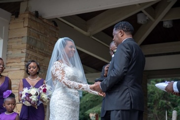 Michael and Tsitsi Taking the Wedding Vows - Wedding Packages Atlanta by Kris Lavender