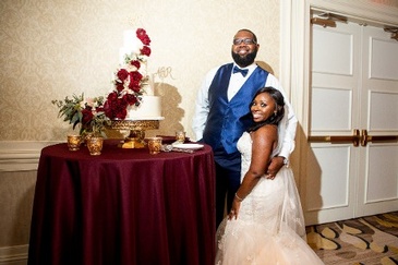 Newly Wed Couple - Ronald and Aprial Standing Near the Wedding Cake - Wedding Packages Atlanta by Kris Lavender