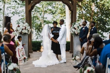 Michael and Shakira Taking the Wedding Vows - Wedding Packages Atlanta by Kris Lavender